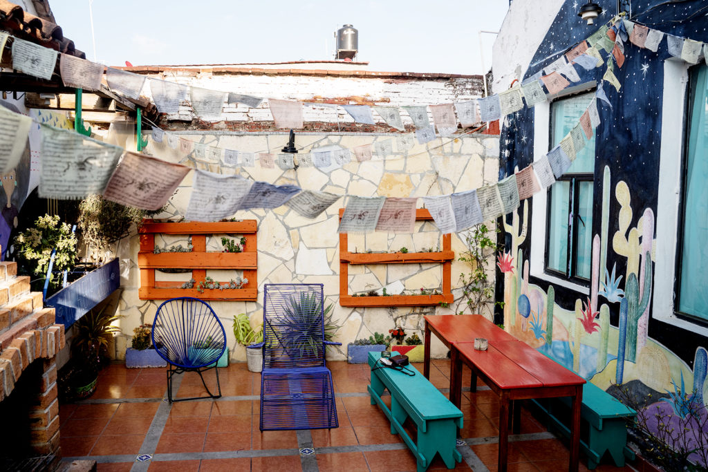 A beautifully decorated hostel terrace.