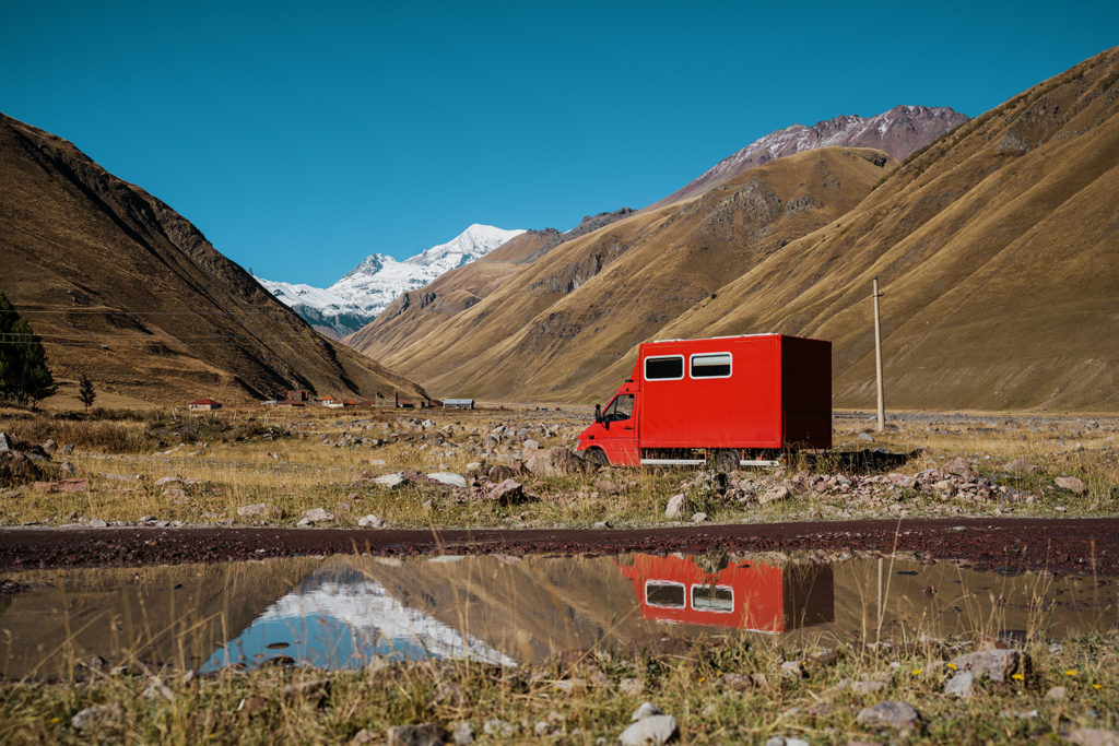 Bright-red Alois is our home on the road.